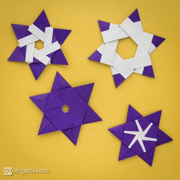 6-pointed modular origami stars, designed by Maria Sinayskaya, folded from  6 square sheets of kami paper without gl…