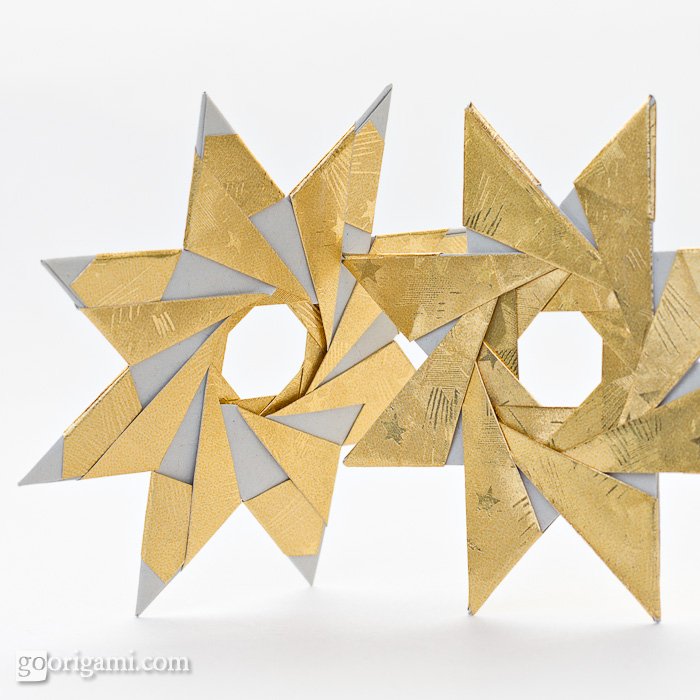 6-pointed modular origami stars, designed by Maria Sinayskaya, folded from  6 square sheets of kami paper without gl…